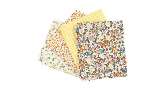 Patchworkstof, 4 design. Gul